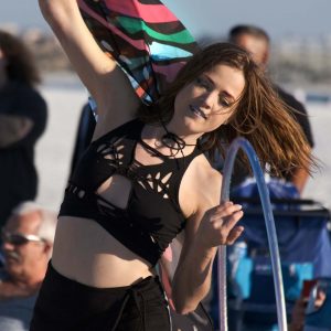 girl dancing with hula hoop at siesta drum circle